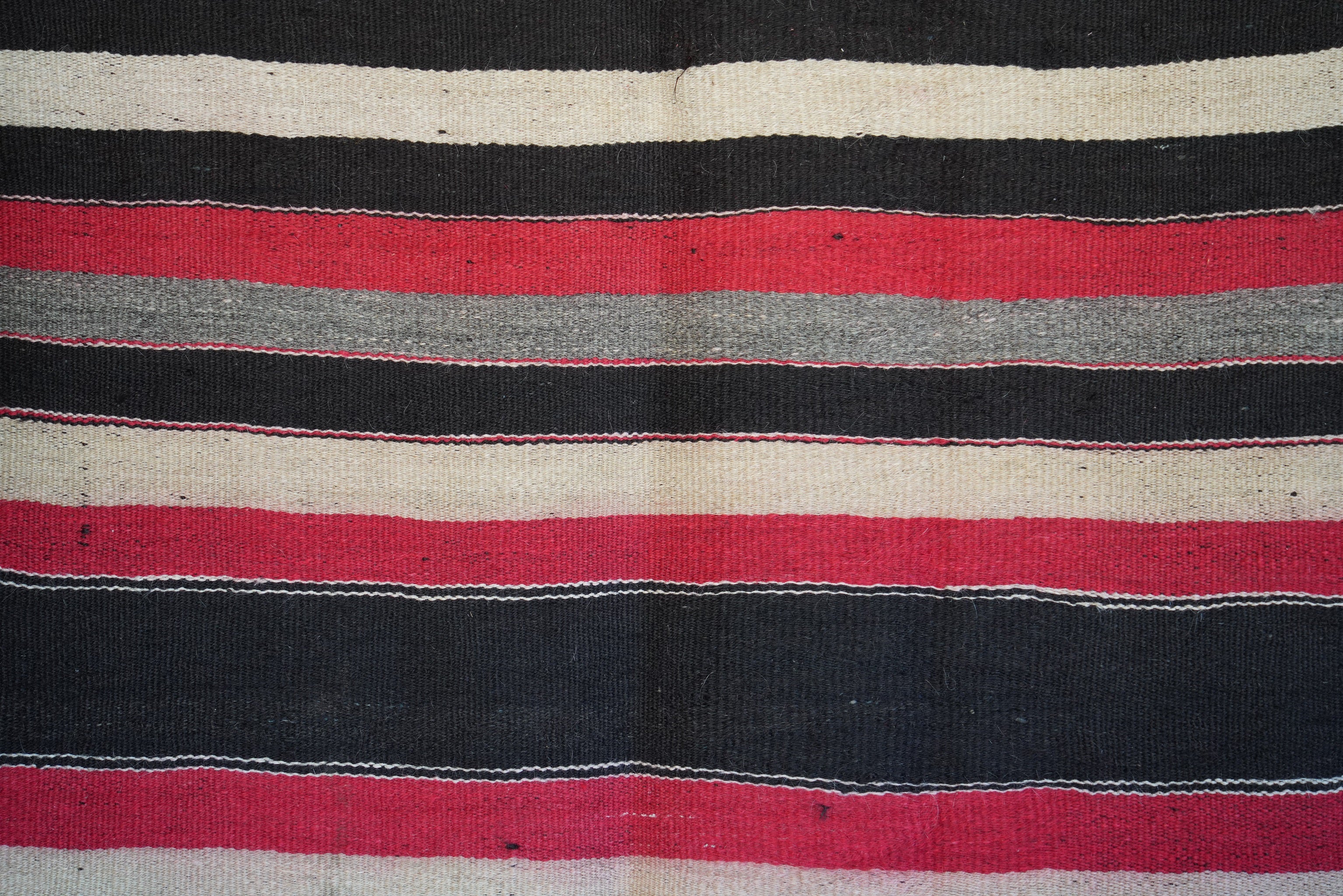 WOOL RUG RED BLACK STRIPED