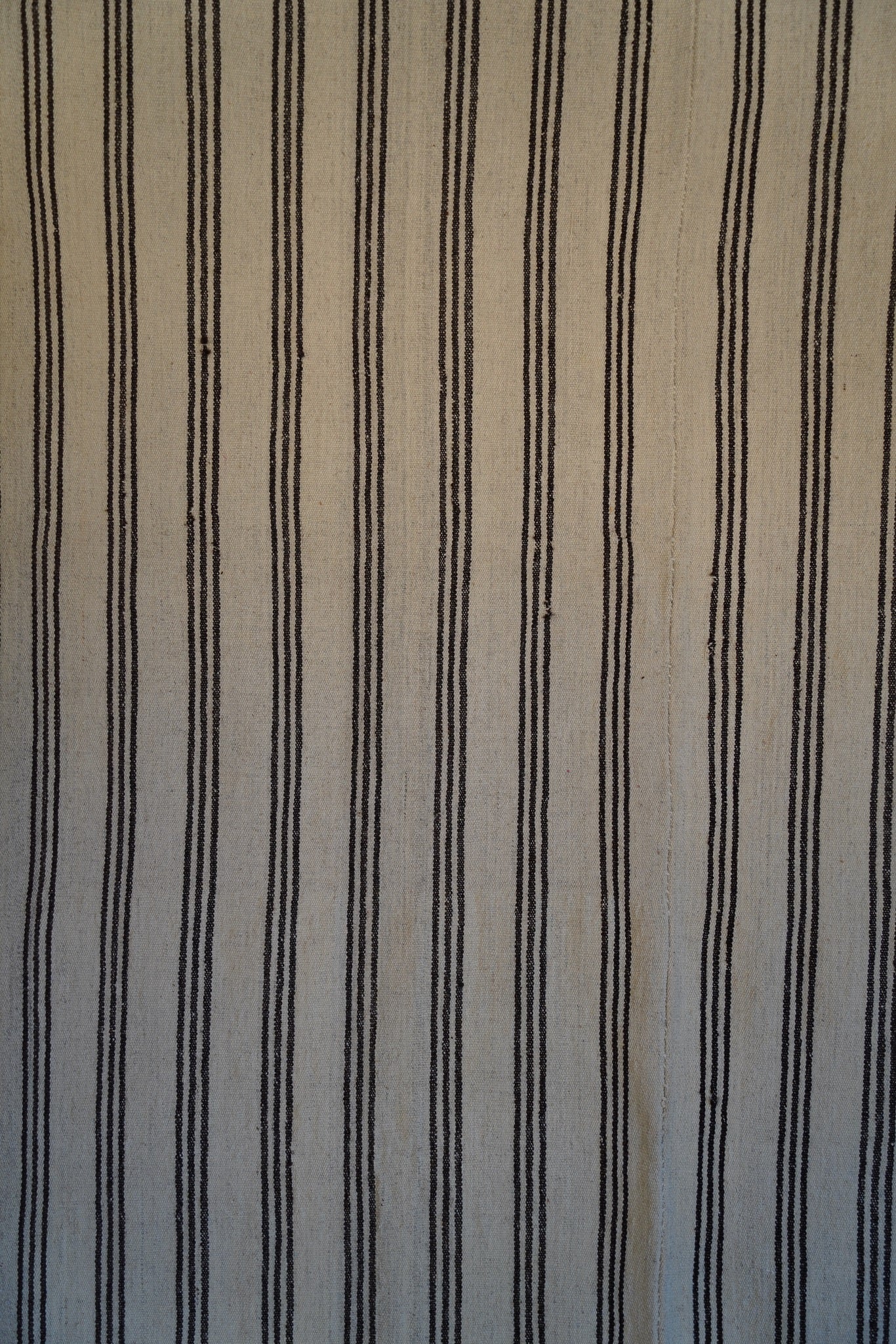 THIN BROWN STRIPED CARPET